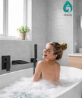 Waterfall Wall Mount Tub Faucet Set With Handheld Sprayer Matte Black Finish Single Handle Tub Filler Solid Brass Construction Boss Look For Your Bath Upgrade installed on bathroom wall
