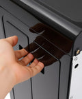 Hand opening the bottom compartment of the bottom loading water cooler dispenser with three temp settings