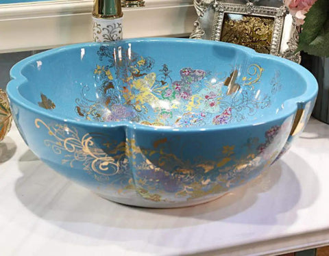 USZWBY Bathroom Vessel Sink, Countertop Basin Ceramic Sink in blue, round basin with floral golden designs for bathroom use.