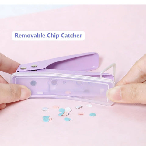 Hands using Heavy Duty Quarter Inch Hole Puncher For Paper And Crafts with see-through chip catcher, displaying confetti from 16 sheet capacity punch