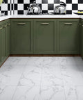 Kitchen with green cabinets and white vinyl peel and stick floor tiles 12x12 inch 16 pack waterproof groutable removable floor tiles.