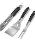 Front view of HAUSHOF stainless steel grill utensil set with black-handled spatula, fork and tongs