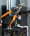 Left-Cutting Offset Tin Snips For Sheet Metal shown in hand, featuring forged blades and heavy-duty steel construction.