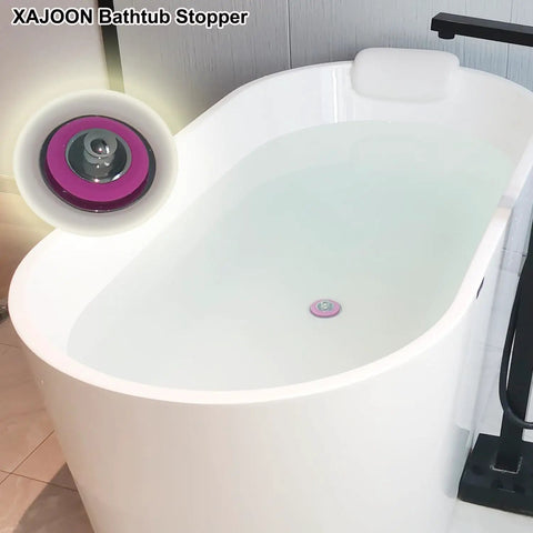 Pink Silicone Bathtub Stopper With Chrome Plated Handle For Standard Drains Super Snug Seal Zero Drip Guarantee Smooth Grip in white tub.