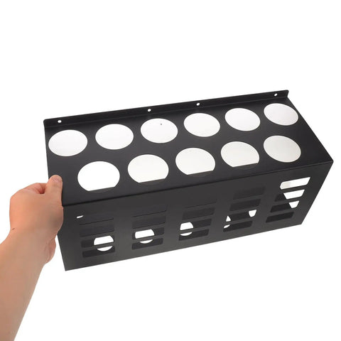 Badass Wall Mounted Caulk Tube Organizer Rack With 11 Hella Durable Slots being held, showing sleek black metal design and storage capacity.