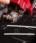 Grab These Top Shelf White Plastic Welding Rods Perfect For Quick Auto Bumper Fixes And Smooth Repair Kits That Make DIY Car Work A Total Breeze With 40 Pieces Included, showing two rods at a welding tool.
