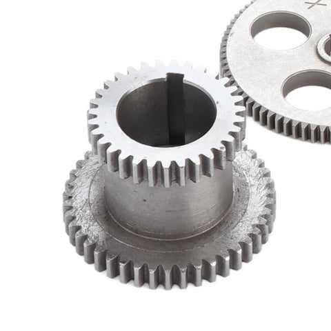 Close-up of metal gears from 18 Piece Lathe Gear Kit For Mini Lathe With Duplex Gears And Motor Belt Pulley, showing teeth detail.