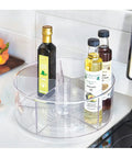 Recycled Plastic Lazy Susan Spin Turntable Organizer For Pantry And Bathroom Space-Saving Go-To Storage Solution For Kitchen Cabinets Drawers And General Organization 11.5 Inch Clear with bottles