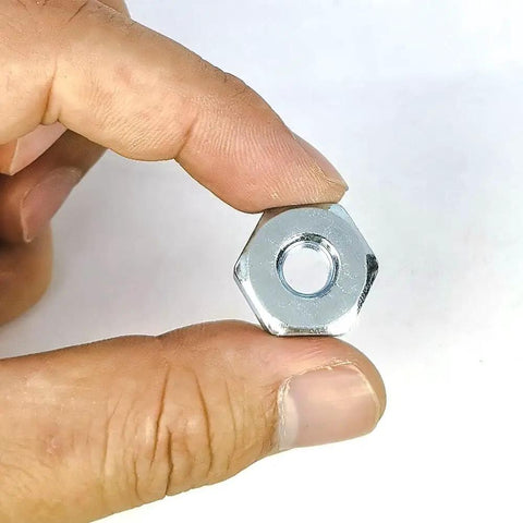 Hand holding a sprocket cover bar nut from the Sprocket Cover Bar Nut Kit For Stihl MS171 MS181 MS192T MS211 chainsaws replacement parts.
