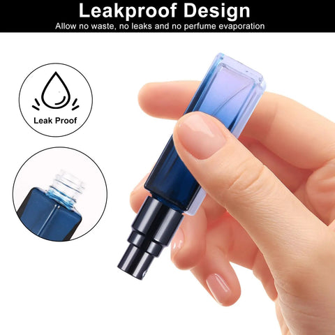 Hand holding blue refillable spray bottle from Four Glass Perfume Spray Bottles Set Refillable Travel Size Atomizers.