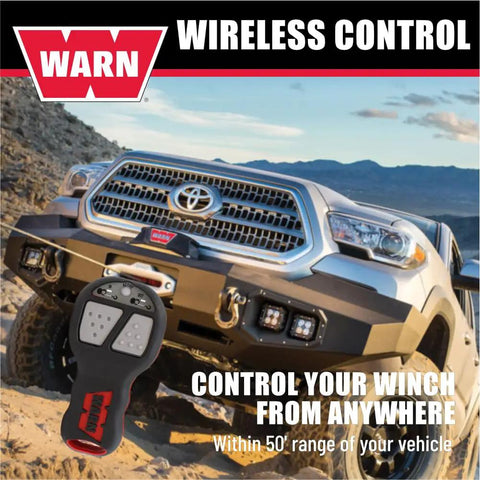 Truck with Wireless Remote Winch Control System For Trucks And SUVs With Transmitter And Receiver fitted for off-road use.