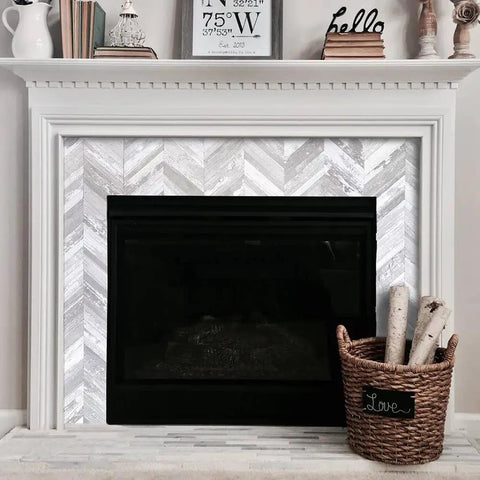 Fireplace with 10 Sheet Herringbone Peel And Stick Backsplash In Vintage White Wood Look PVC for DIY friendly decor.