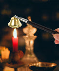 Premium Copper Bell Shaped Candle Flame Snuffer Featuring Six Level Retractable Handle used to extinguish candle flame safely.