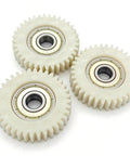 Three 36T nylon gears with bearings, part of Beefy E Bike Motor Gear Set With Planetary Drive 36 Tooth Nylon Gear 38Mm Outer Diameter 12Mm Thick 8Mm Bearings Wheel Hub Compatible Easy Swap In For Electric Bike Repairs And Upgrades.