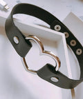Genuine PU Leather Love Heart Choker Necklace For Men Women With Rugged Gothic Chain Adjustable Collar shown on a surface.