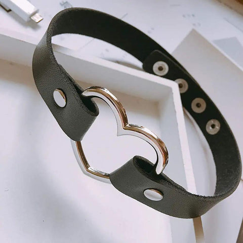 Genuine PU Leather Love Heart Choker Necklace For Men Women With Rugged Gothic Chain Adjustable Collar shown on a surface.