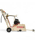 Rugged No Fuss 18 Inch Electric Walk Behind Saw Equipped With A Game Changing Five Horsepower Motor For Clean Down Cutting Up To Six And Three Quarters Inches, side view with handle and motor detail.