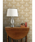 Custom Printed Block Print Faux Vinyl Wallpaper Featuring Subtle Leather Texture And Next Level Commercial Grade Durability Professional Paste Application For Event Spaces And Home Refreshes Built Tough, displayed with lamp and books.