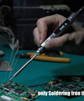 Hand using a soldering iron on circuit board with 7 Piece Mini Stainless Steel Soldering Iron Tip Set For TS100 TS101.