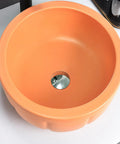 Round Sink Bowls For Bathroom Vessel Sink, 15.7 Inch Ceramic Vessel Sink With Faucet And Drainer Above Counter Bathroom Vanity Sink Bowl Art Wash Basin in orange color.