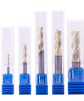 Pro Grade Solid Carbide End Mill Set For Aluminum 5 Pcs One Eighth To Three Eighths Inch ZRN Coated 3 Flute 37 Degree Helix HRC55 CNC Router Bits Square End Bits displayed in transparent cases.