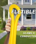 Hand holding Beefy 50 Foot 30 Amp Generator Extension Cord 4 Prong NEMA L14-30P To L14-30R, 10 Gauge STW, showing flexibility.