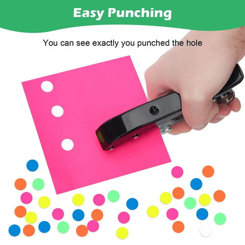 Person using Heavy Duty Three Eighths Inch Single Hole Punch For Paper Crafts Portable Ten mm Circle Hole Puncher on pink paper with colorful stickers.