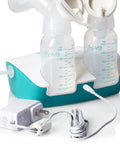 Hospital Strength Double Electric Breast Pump With Custom Suction Controls And Lowkey Quiet Motor To Keep Pumping Sessions Smooth Plus Wall Battery Car Adapter And Spare Parts Included with two bottles and power adapter.