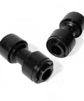 Drip irrigation 1/4-in quick-connect straight couplings, two black plastic fittings, angled view
