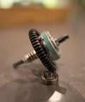 Close-up of 4x4 RC Upgrade Kit: 54T Metal Spur Gear 32P With Full Clutch Assembly for Slash Rustler 4WD on a table.