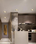 12 Pack Real Deal Copper LED Recessed Ceiling Lights, 12W Dimmable Downlights With Slick Baffle Trim in modern kitchen.