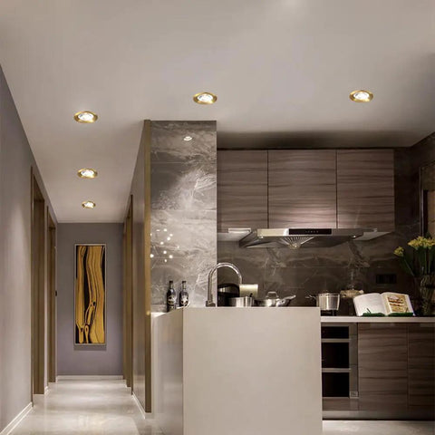 12 Pack Real Deal Copper LED Recessed Ceiling Lights, 12W Dimmable Downlights With Slick Baffle Trim in modern kitchen.