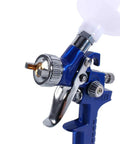 Precision Mini Gravity Feed HVLP Spray Paint Gun With 0.8mm Nozzle And 100ml Cup showing nozzle and trigger for detailed lacquering.