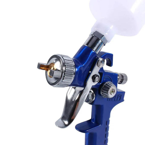 Precision Mini Gravity Feed HVLP Spray Paint Gun With 0.8mm Nozzle And 100ml Cup showing nozzle and trigger for detailed lacquering.