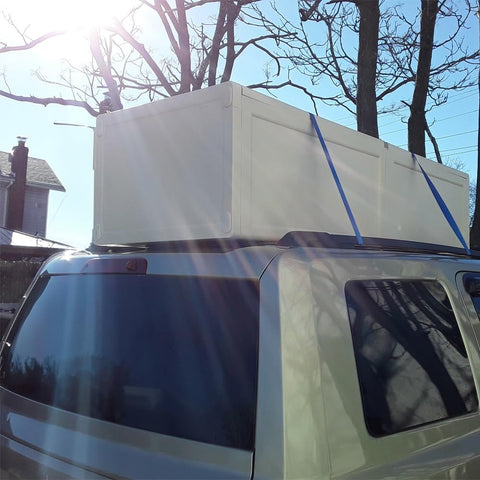 Vehicle carrying large box secured with Premium Ratchet Tie Down 1 Inch By 16 Feet With Rubber Coated S Hooks, 1000 Lbs Working Load