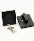 Utica Square Entrance Lever And Single Cylinder Deadbolt Combo Pack Matte Black with keys on display