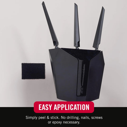 Velcro Brand heavy-duty adhesive strips, 4x2 in, black; 8 sets, shown beside a black router with three antennas