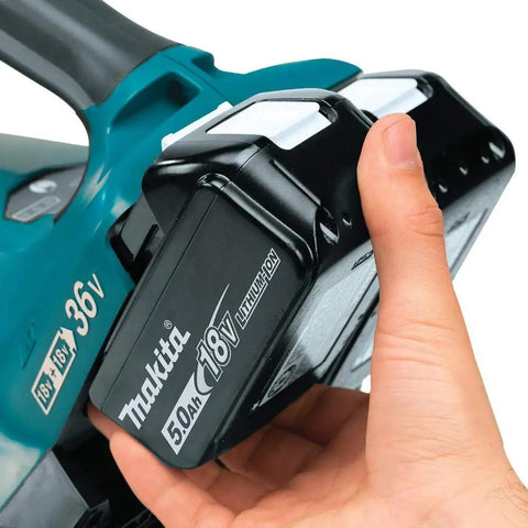 Top Tier Heavy Hitter 36V Brushless Leaf Blower Kit With Dual 18V Batteries showing 5.0Ah lithium-ion battery in hand.