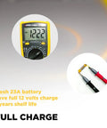 Top Tier A23 23A 12V Alkaline Batteries Five Pack tested with multimeter showing full charge for reliable power.