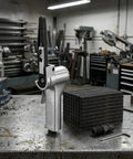 Top Shelf Pneumatic Air Belt Sander With A Ridiculously Fast 10 Mm Track And Hog Wild 16000 Rpm Motor on workshop table.