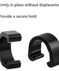 Close-up of black aluminum C-clips from 12 Pack Aluminum Alloy Bicycle Cable Clamps And C Clips For Housing And Hose Guides Brakes Derailleurs And Shifters Dope MTB And Road Bike Cable Management Durable Easy Install Secure Fit.