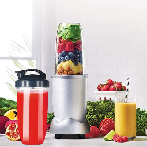 Blender with fruits and Two 32oz Replacement Blender Cups With To Go Lids For NutriBullet 600W And Pro 900W in kitchen setting