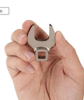 Hand holding 19 mm wrench from 3/8 Inch Drive Crowfoot Wrench Set, 17-Piece 8-24 mm, Ultra Compact For Tight Spaces, Heavy-Duty Steel Construction