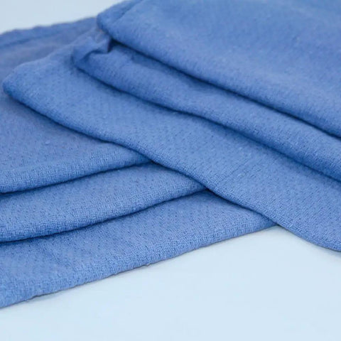 Blue folded towels from Pro Grade Reclaimed Huck Towels Box With 25 Lb Contents, About 225 Recycled Rags, 100 Percent Cotton