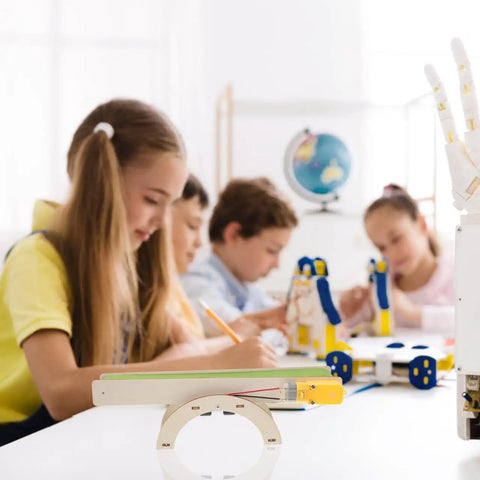 Children engaging with DIY Electric Conveyor Belt Kit For Kids Hands On STEM Learning, 2 Piece Educational Model in classroom setting.