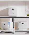 Skip The Sink Blues With This Plug And Play Countertop Dishwasher Featuring Heavy Duty High Temp Cycle triple wash filters in kitchen.