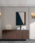 Antique Bronze Two Light Sconce For Bathroom Vanity With Dual Two Point Eight Inch Cylinder Glass Shades mounted on wall