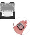 2 Pack Spring Loaded Push Button Cover With Adhesive Backing Dustproof Power Switch Protector For Car Ignition Industrial Control Panels And Home Appliances Durable Button Guard That Keeps Dirt Out And Extends Lifespan Like A Champ., transparent spring-loaded adhesive button cover shown closed and in hand