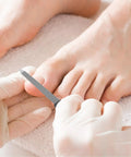Using Dual Use Nail File And Dead Skin Fork 6.29 Inch Stainless Steel Nail Cuticle Trimmer With V Shaped Dead Skin Pusher for pedicure.