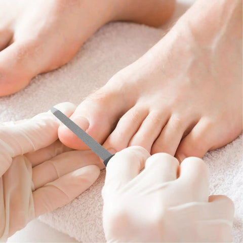 Using Dual Use Nail File And Dead Skin Fork 6.29 Inch Stainless Steel Nail Cuticle Trimmer With V Shaped Dead Skin Pusher for pedicure.